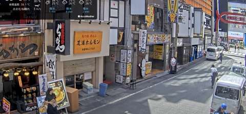 View of Kabukicho district in Shinjuku, Tokyo, Japan — street with neon signs and pedestrians